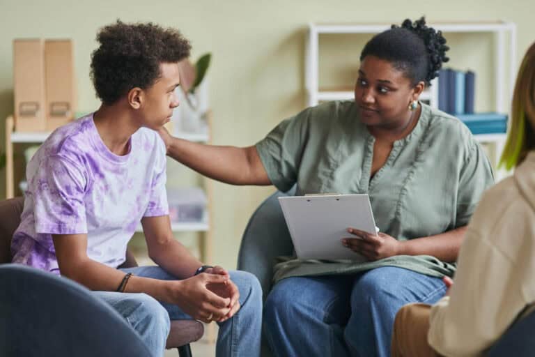 Counseling session with supportive therapist and patient