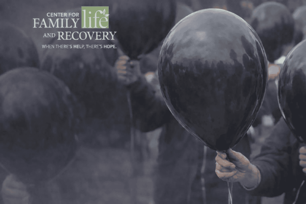 Black balloon event by recovery center.